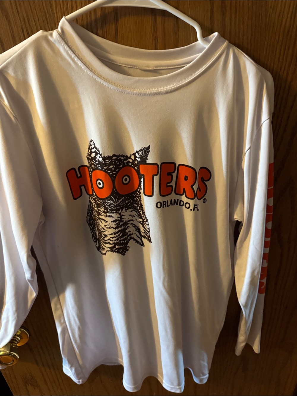 Hooters Kids Long-Sleeve Tee in White with Orange Logo